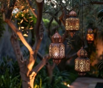 A garden path lit by solar lanterns, l